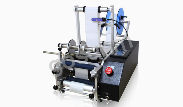 半自動(dòng)圓瓶貼標(biāo)機(jī) 半自動(dòng)圓瓶貼標(biāo)機(jī)